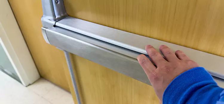 Installing a Push Bar on a Door Carignan